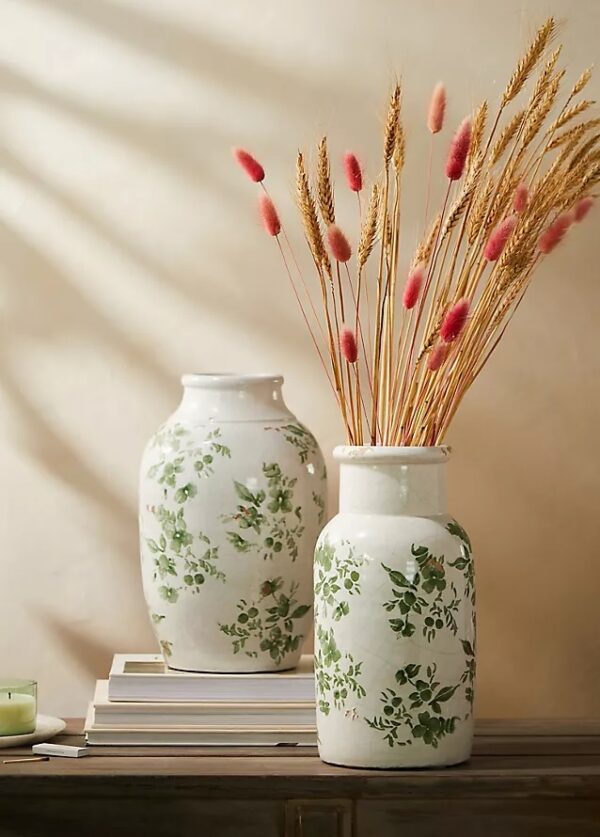 green and white handmade vintage ceramic vase with painted ivy pattern