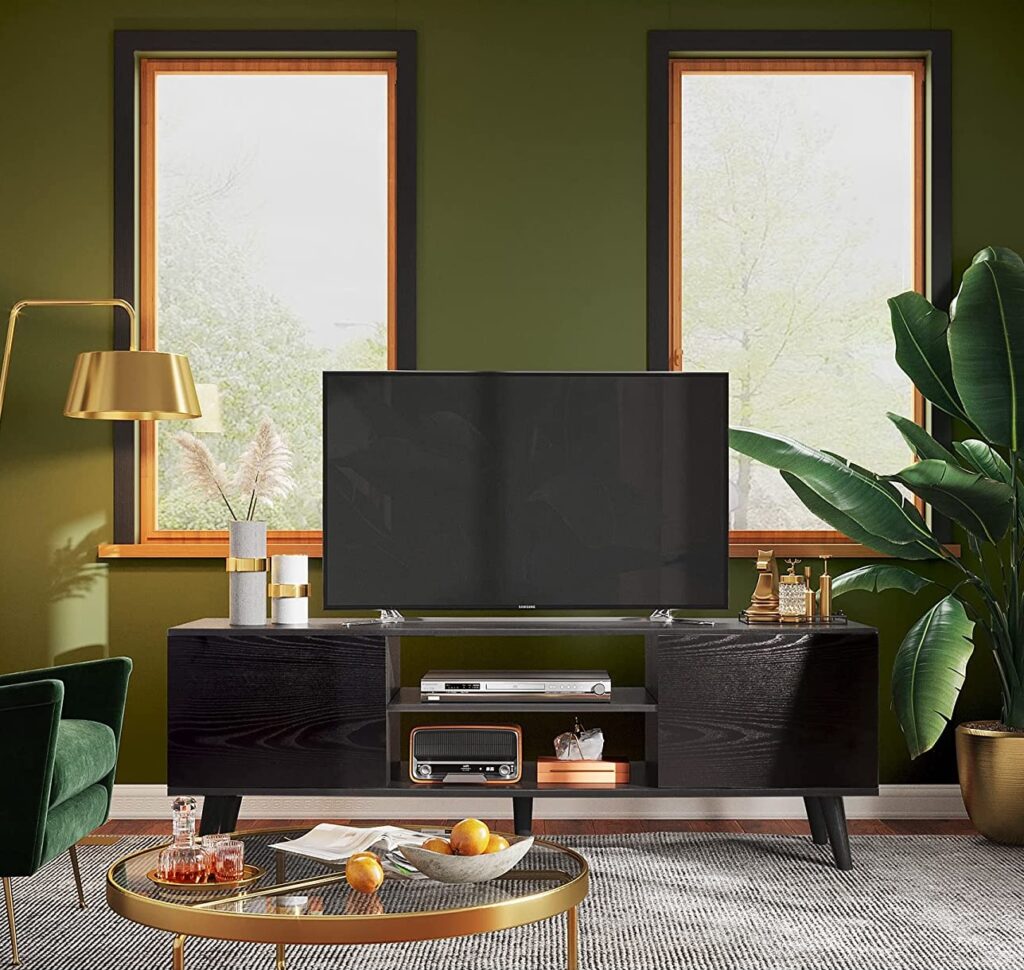 beautiful black media console with open storage cubbies and