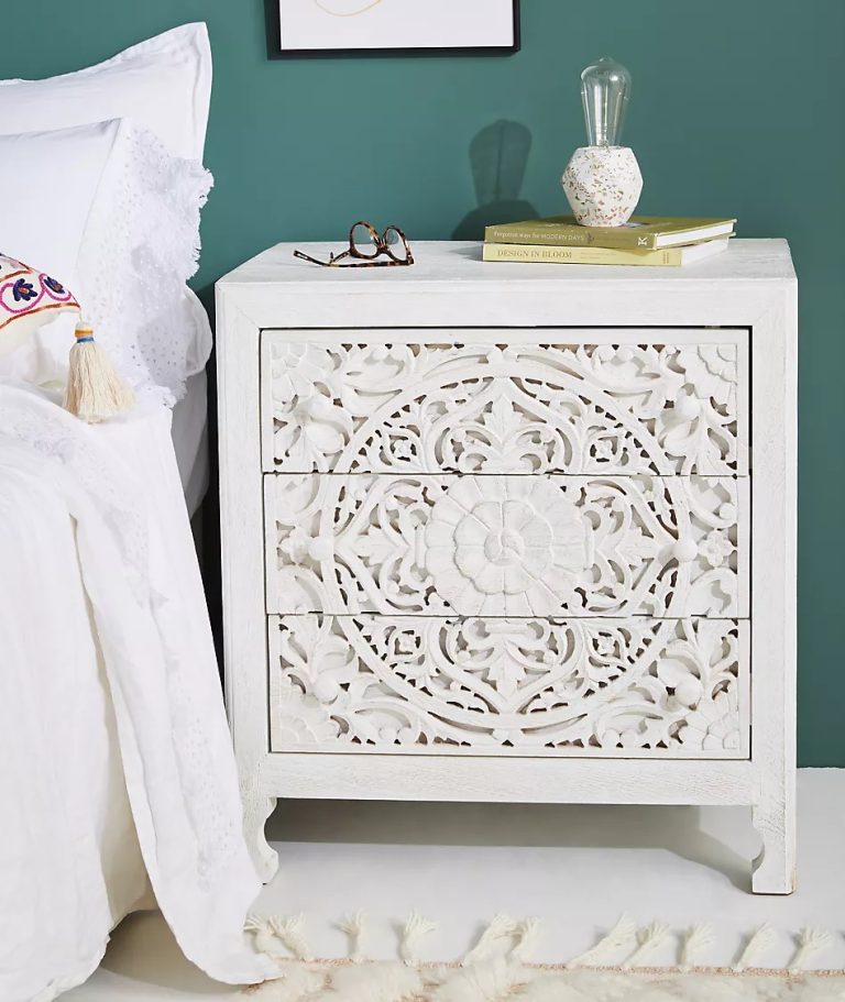 antique white side table with beautiful handcarved floral details