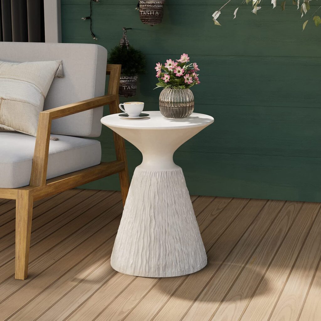 modern white outdoor side table with textured base and smooth surface