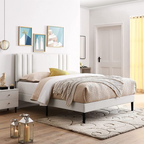 https://www.home-designing.com/wp-content/uploads/2022/11/white-full-size-bed-frame-with-faux-leather-upholstery-vertical-channel-tufting-black-tapered-legs-clean-lines-minimalist-beautiful-Scandinavian-bedroom-design-inspiration-600x600.jpg