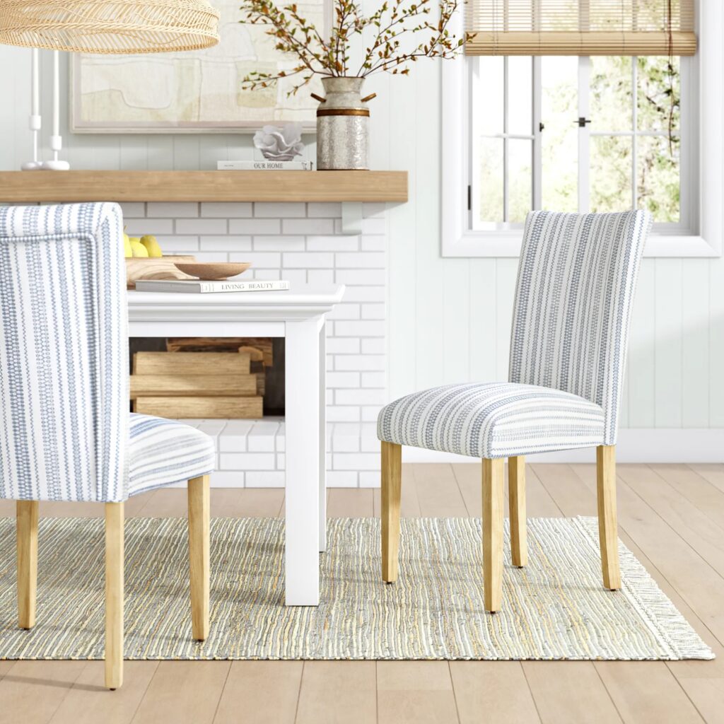 coastal blue and white dining chairs with tall backrest and full