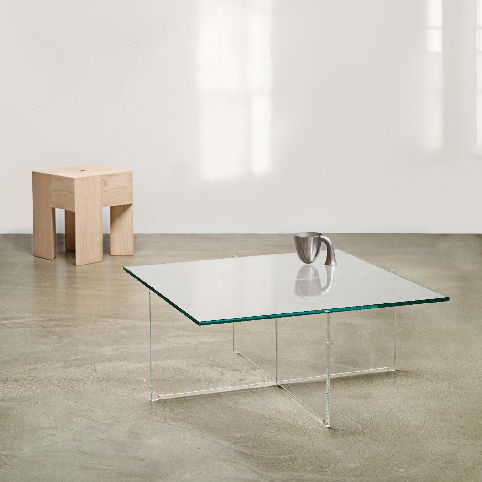 designer square acrylic coffee table with tempered glass tabletop and