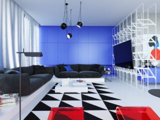 A Bright Blue And Red Home That Looks Like Living Art
