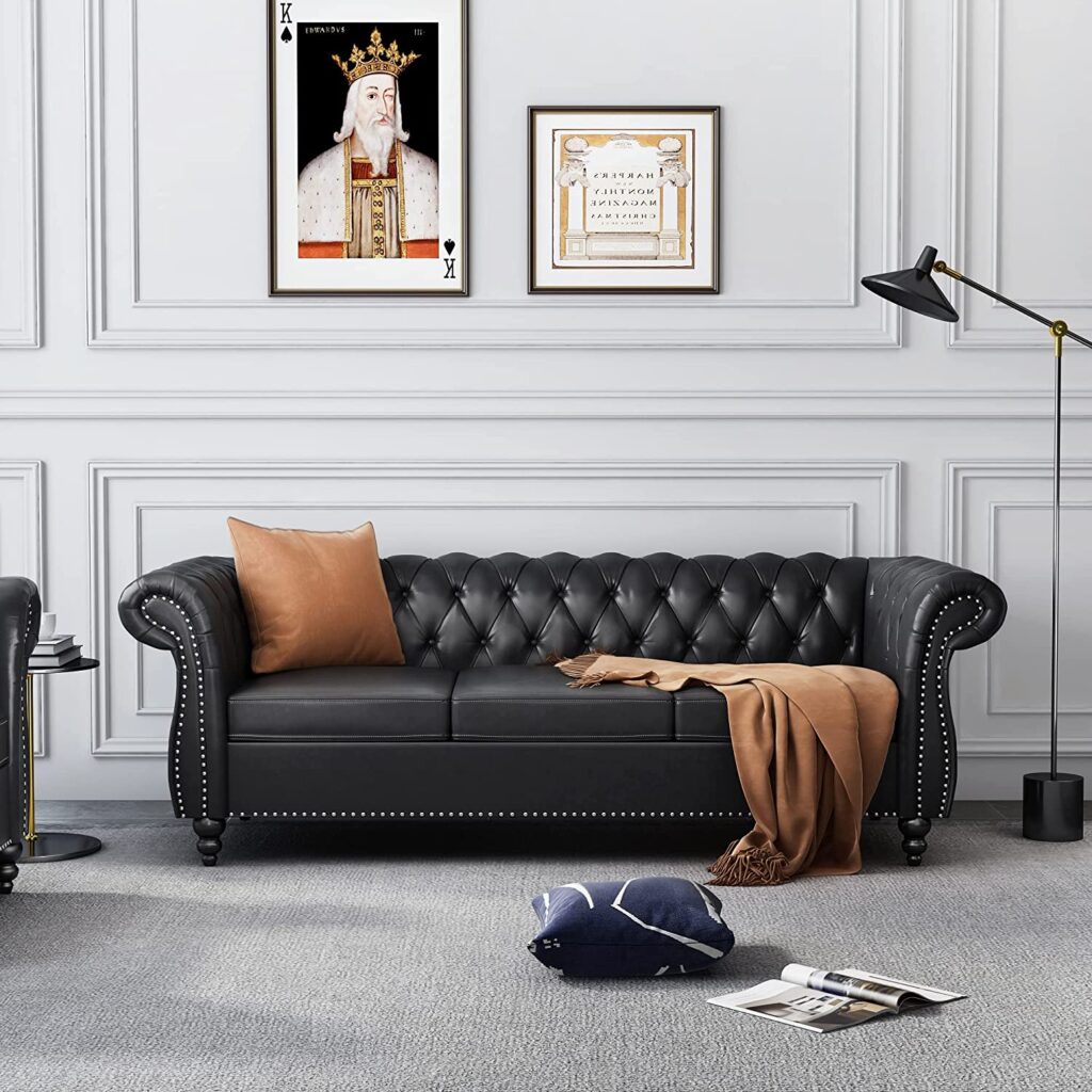 classic chesterfield black faux leather couch with diamond tufted