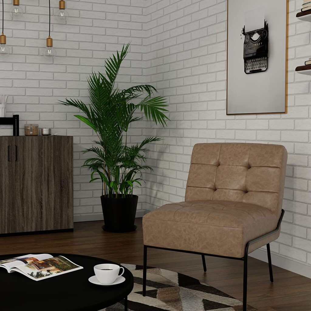 light brown leather accent chair with black metal framing armless