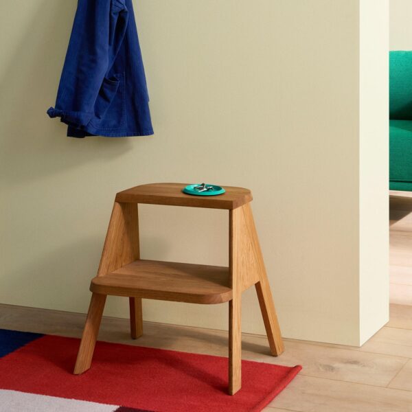 Small wooden shop stool for sitting