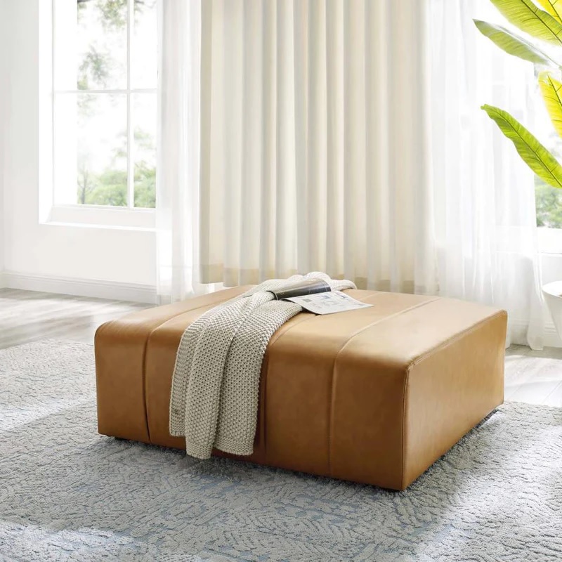 camel colored large leather ottoman with stitched tufted details and pocket coil springs comfortable modular living room ottomans for sale online oversized cocktail ottoman