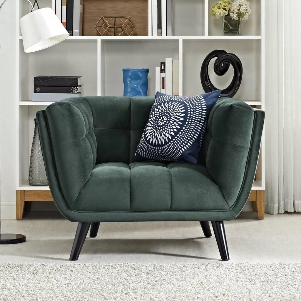 muted dark velvet green accent chair with interior tufting and smooth