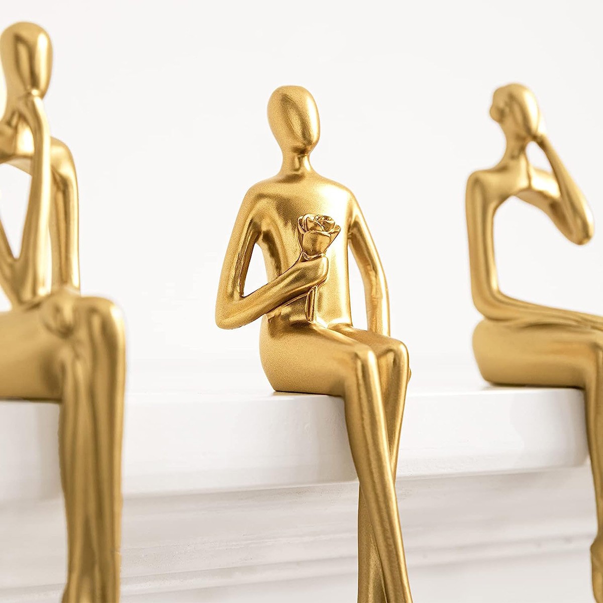 sitting figurines