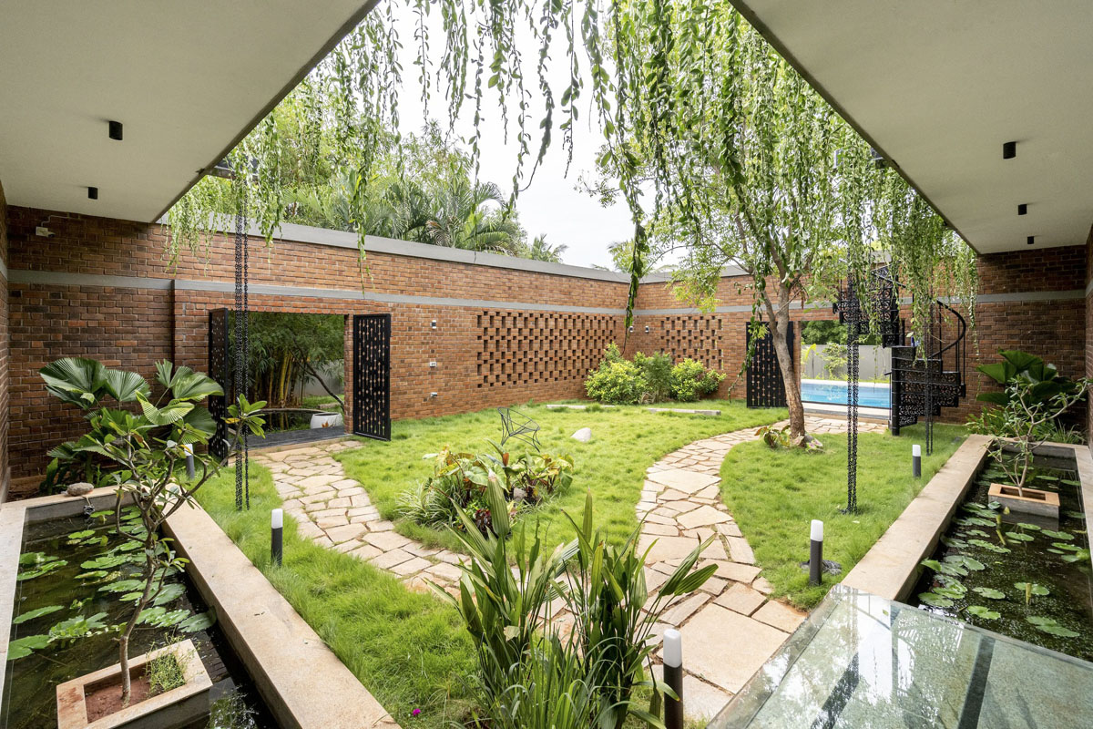 A Glimpse into the Enchanting Courtyards of Two Extraordinary Properties thumbnail