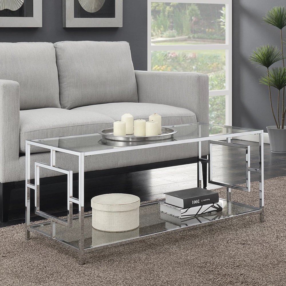 silver glam living room coffee table with glass tabletop and open lower shelf for storage glamorous cocktail table rectangular shape lattice sides contemporary decor themes