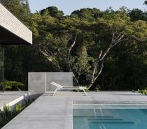 brutalist house with swimming pool