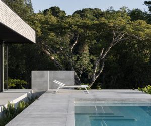 brutalist house with swimming pool