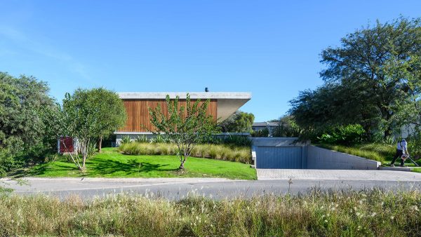 A Wood And Concrete House That Opens To A Welcoming Pool [Video]