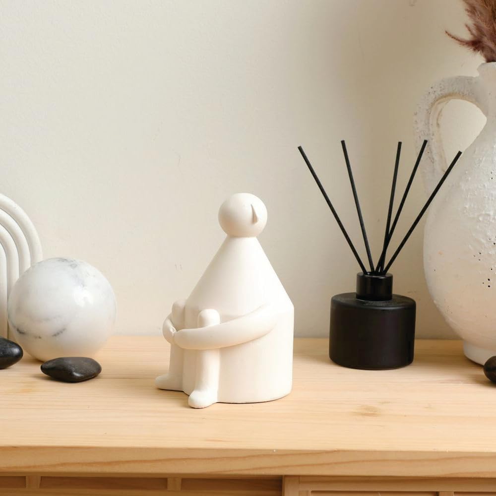 contemplative ceramic figurine 1