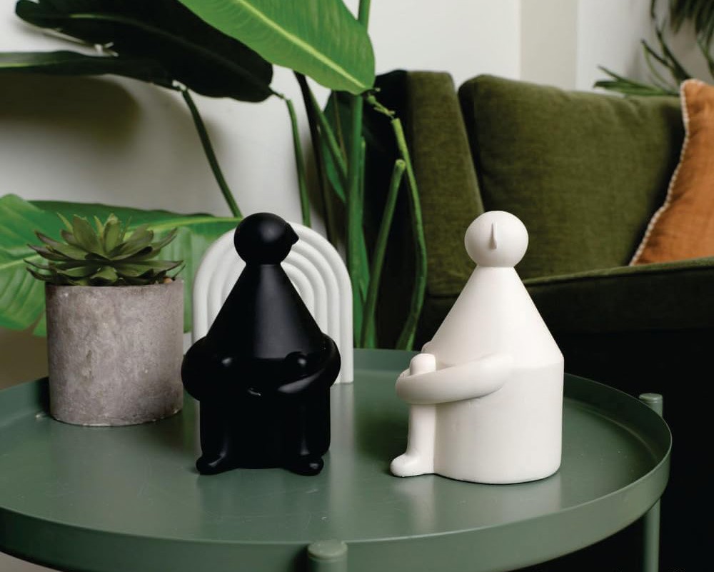 contemplative ceramic figurine 2
