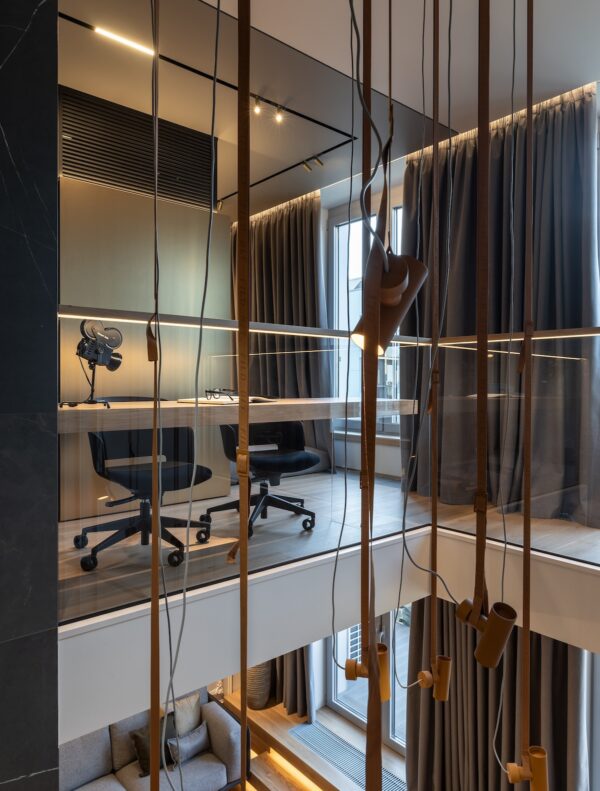 Image showcasing Urban Sophisticate: A Two-Story Apartment Blending Modern Ascetic with ...