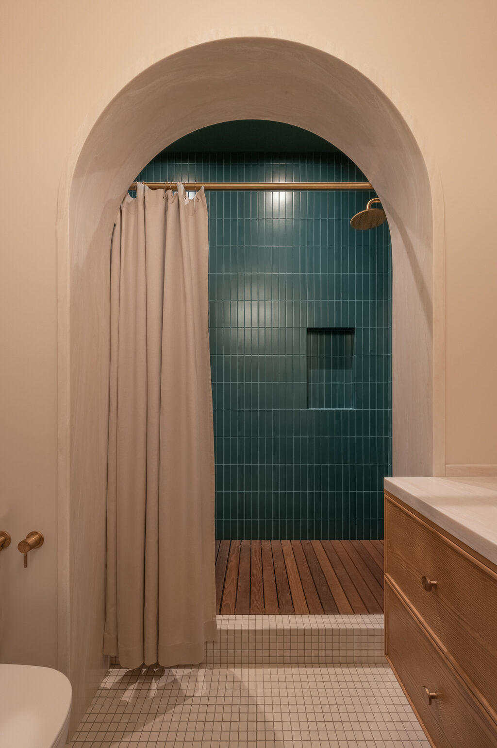 teal blue accent wall in shower