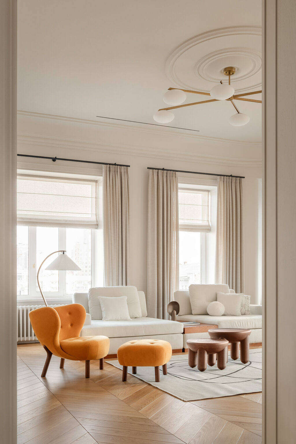 windows with roman shades and drapes