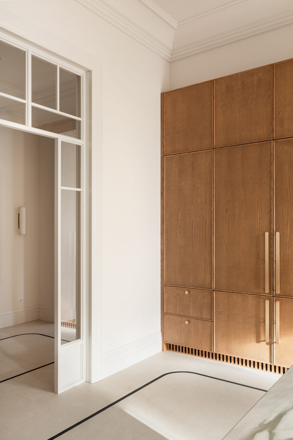wooden cabinetry with metallic hardware
